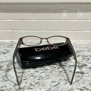 Bebe prescription eyeglasses. Metallic Rose gold, dark brown, and leopard print.